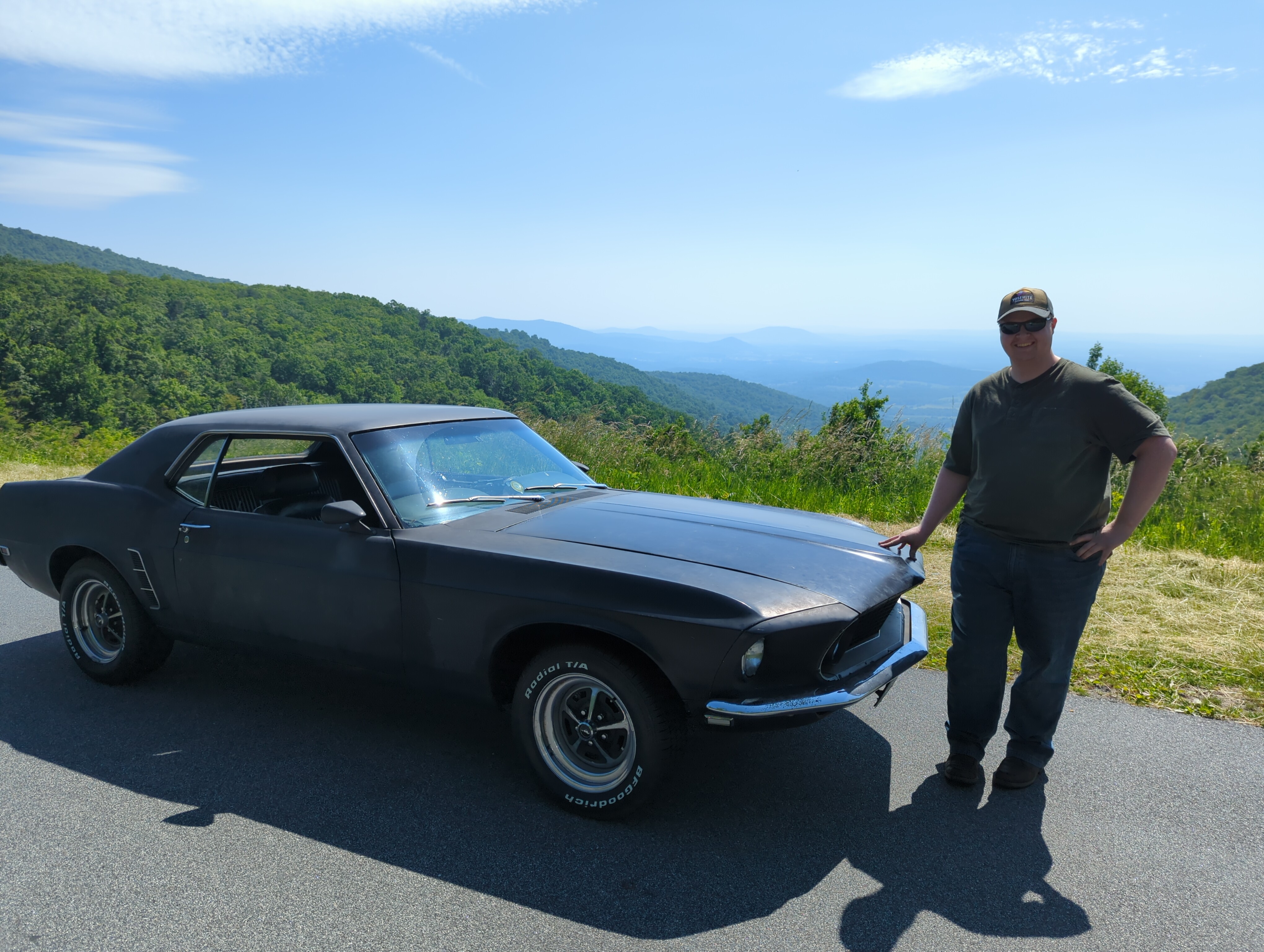 Me standing next to the car on Skyline Drive